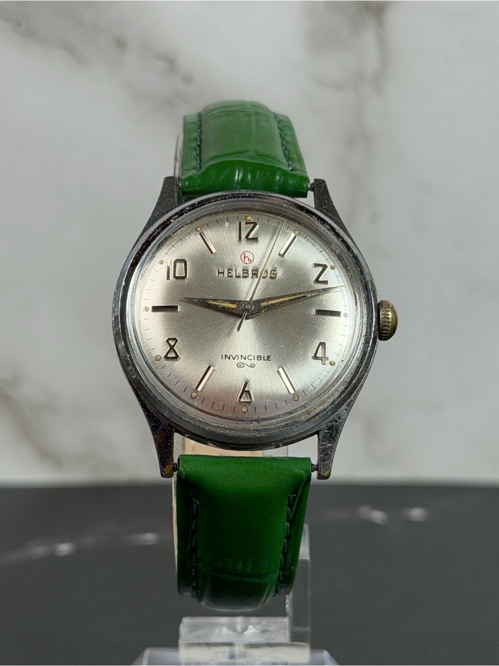 Vintage Helbros Invincible Manual Wind Watch Swiss Made Silver Dial Green Strap